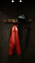 Close-up of clothes hanging on wall