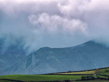 View of landscape against cloudy sky