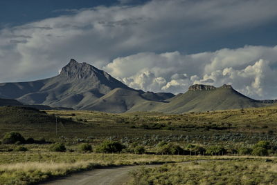 Landscape with mountain range in background