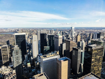 High angle view of modern buildings against sky