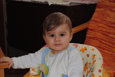 Portrait of cute baby at home