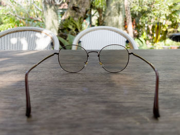 Close-up of eyeglasses on table