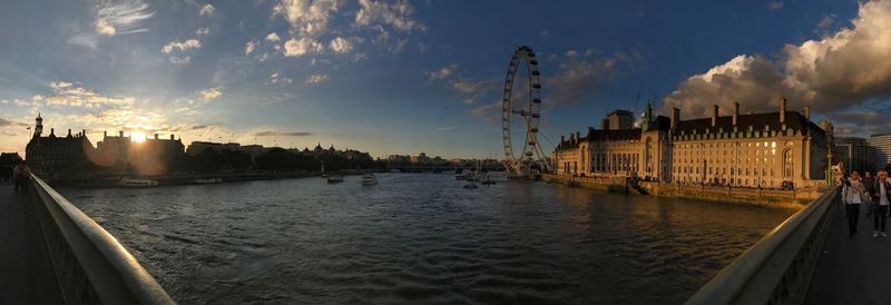 Panoramic view of river against sky during sunset