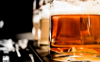 Close-up of beer in glass on table