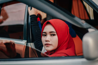 Portrait of man in car