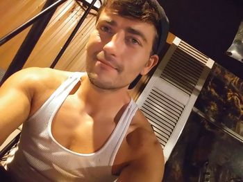 Portrait of young man looking away