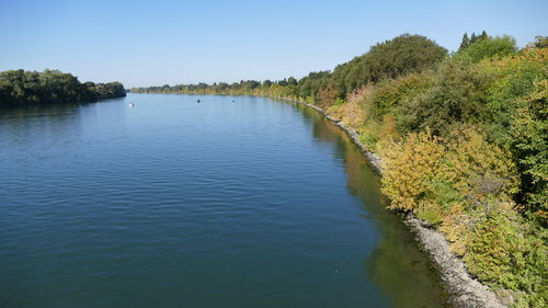 Scenic view of lake against clear sky
