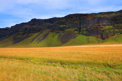 Scenic view of landscape against sky during autumn