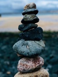 Close-up of stone stack on rock