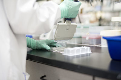 Close-up of scientist working in laboratory