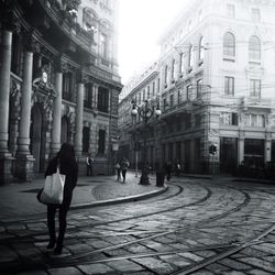 Woman standing in city