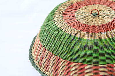 Low angle view of hat against white background