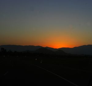 Scenic view of mountains at sunset