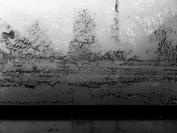 Close-up of water drops on glass