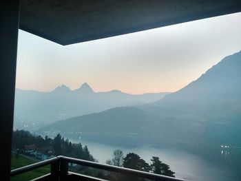 Scenic view of mountains against sky during sunset