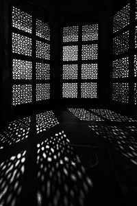 Close-up of window on table in building