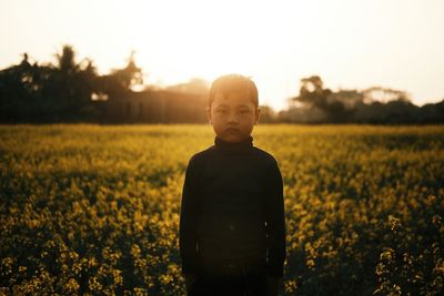 Boy in a mustard field, barpeta assam