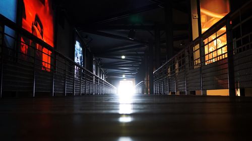 Interior of illuminated building at night