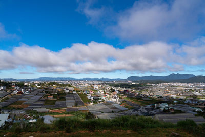 High angle shot of townscape against sky