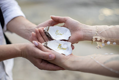 Cropped hand of person holding heart shape