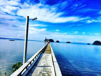 Scenic view of sea against blue sky