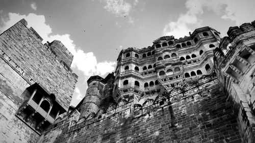 Low angle view of old building against sky