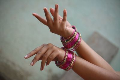 Cropped hand with bangles
