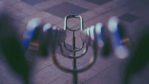 High angle view of lighting equipment on tiled floor