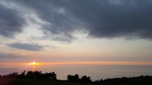 Scenic view of sunset over sea