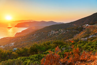 Scenic view of landscape against sky during sunset