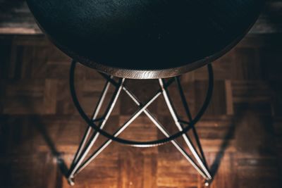 Close-up of empty seats on hardwood floor