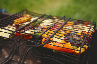 Close-up of meat on barbecue grill