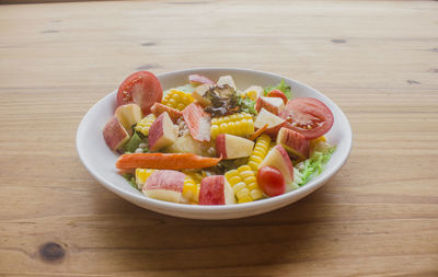 Salad with mixed vegetables, fruit