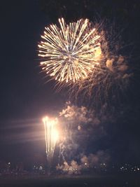 Firework display at night