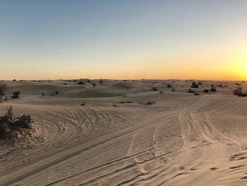 Scenic view of desert against clear sky