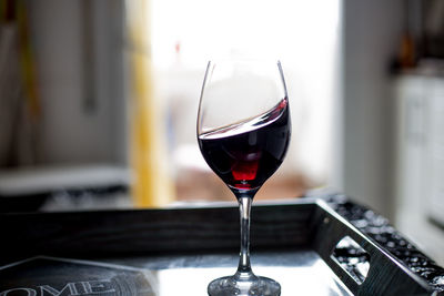 Close-up of wine glass on table