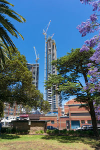 Low angle view of modern buildings against sky