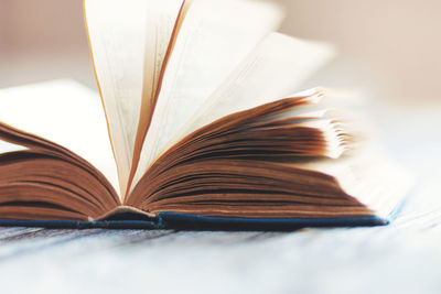 Close-up of open book on table