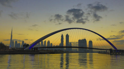 View of suspension bridge at sunset