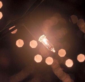 Defocused image of illuminated light bulb