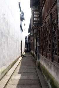 Narrow alley along buildings