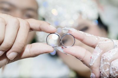 Close-up of hand holding hands