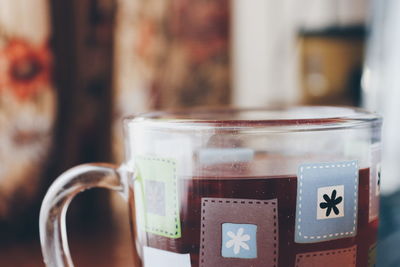 Close-up of coffee cup on table