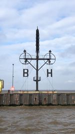 Pier over sea against sky