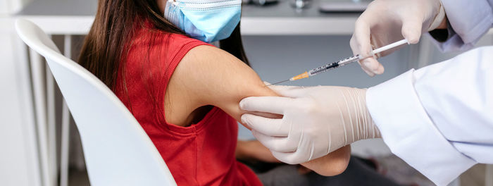 Midsection of woman holding hands