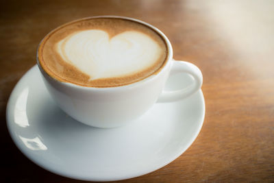 High angle view of cappuccino on table