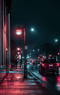 Illuminated street lights at night