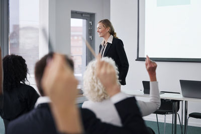 Woman having presentation during business meeting