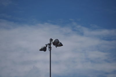 Low angle view of street light against sky