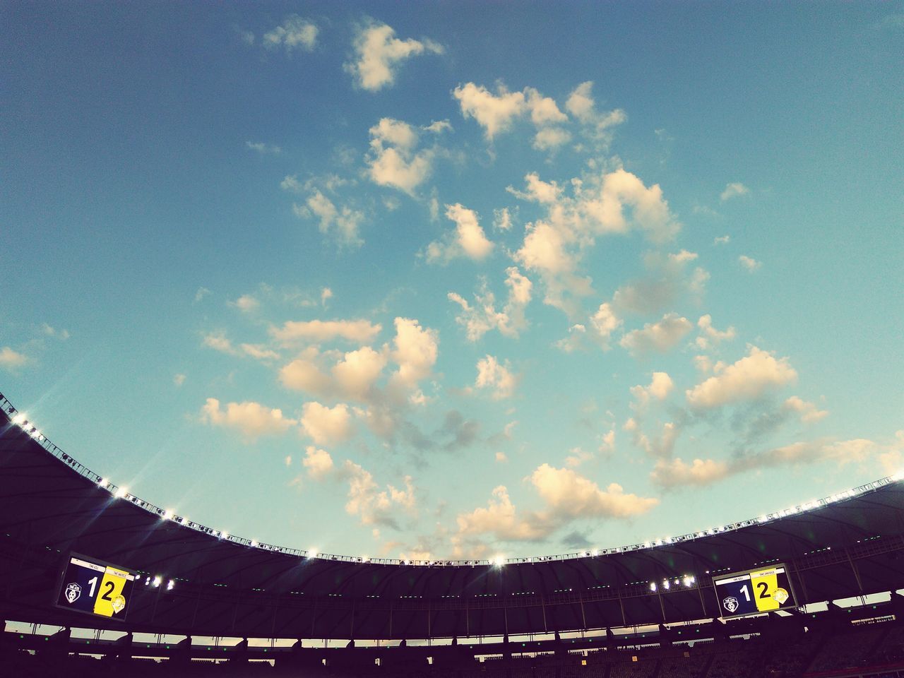 sky, low angle view, cloud - sky, built structure, outdoors, architecture, sport, no people, nature, day